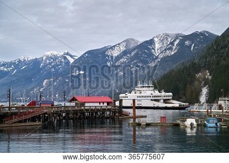Horseshoe Bay Ferry Terminal Winter. A Bc Ferry Pulls Into The Horseshoe Bay Ferry Terminal In West 