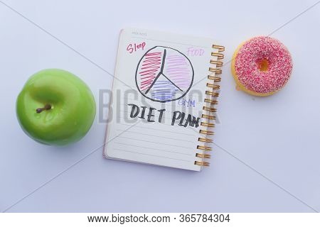 Diet Plan, Menu Or Program, Apple And Donuts On Table