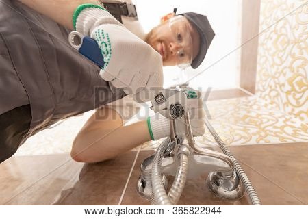 Plumber Installing Shower Stall, Work In Bathroom