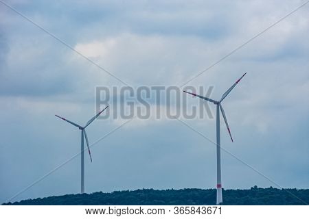 Landscape With Windmills Under The Clody Sky