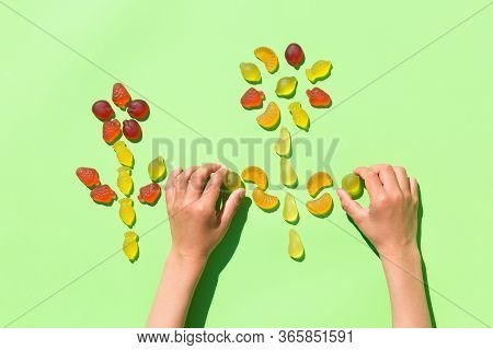 Childs Hands Making Picture With Jelly Candies, Arts And Crafts