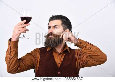 Barman With Curious Face Looks At Italian Alco Drink