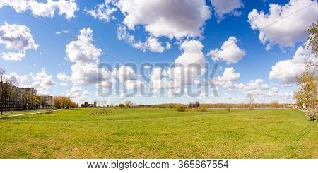 Spring Greens Under The Clouds.
Spring View Of The Province On A Sunny Day.