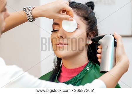Beautiful Young Brunette Woman Receiving Airbrush Professional Makeup With Aerograph With Aerograph 
