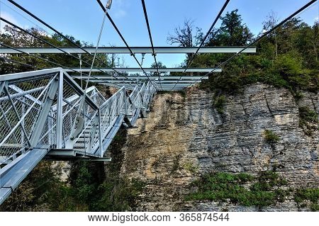 Skybridge In Sochi. Suspension Bridge Over The Gorge. Made Of Metal And Other Modern Materials. The 
