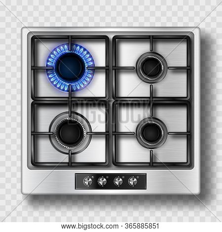 Gas Stove Top View With Blue Flame And Black Steel Grate. Kitchen Burner With Lit And Off Hobs. Real