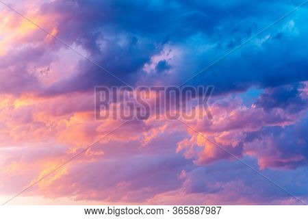 Dramatic Sky With Bright Red And Dark Blue Stormy Clouds. Nature Background
