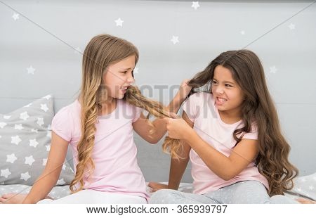Unhand My Hair. Naughty Children Pull On Hair. Beauty Look Of Little Girls. Hair Salon. Home Clothin