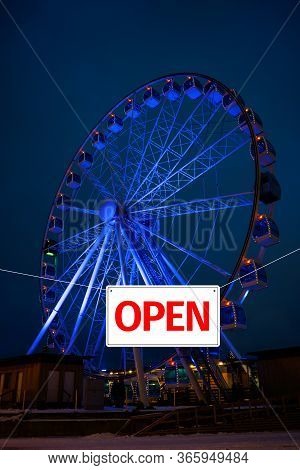 It Is Open Again. Out Of Isolation Due To Pandemic. Passage To Ferris Wheel Is Open. Concept Of Open