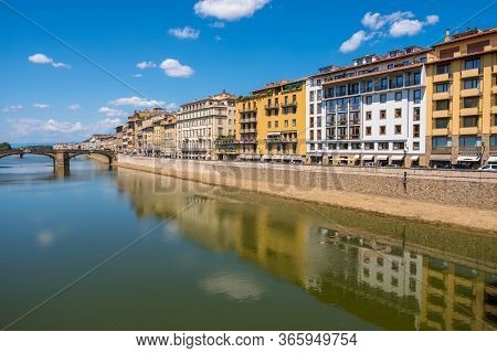 Florence, Italy - August 16, 2019: The Ponte Di Santa Trinita Or Holy Trinity Bridge Over River Arno