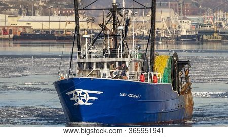 New Bedford, Massachusetts, Usa - January 10, 2018: Trawler Luso American I Crossing Icy New Bedford
