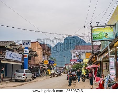 Vangvieng/lao-4 Dec 2017:unacquainted People Walking On Vangvieng Downtown In Lao.vangvieng City The