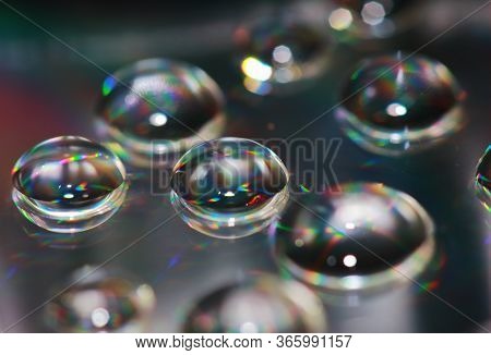 Reflection Of Dropet On Cd In Macro For Background