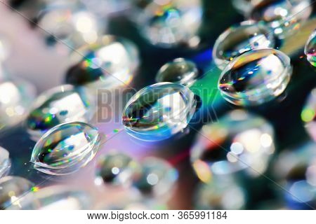 Reflection Of Dropet On Cd In Macro For Background