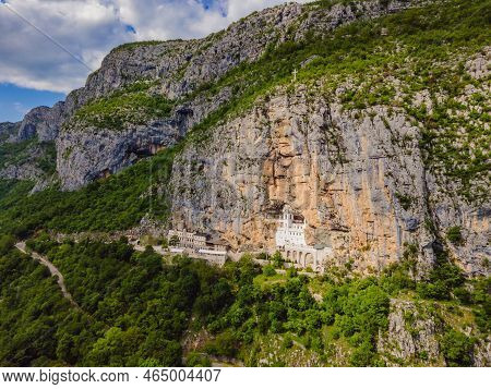 Monastery Of Ostrog, Serbian Orthodox Church Situated Against A Vertical Background, High Up In The 