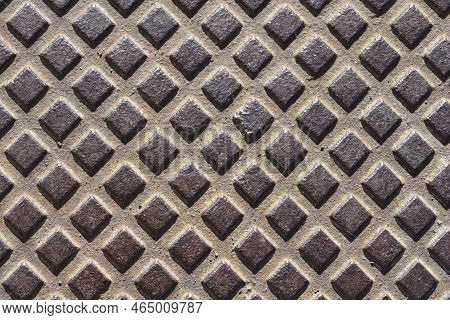 Close Up Detail Of A Manhole Cover