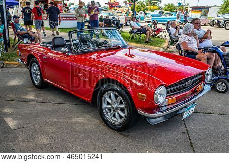 Des Moines, Ia - July 01, 2022: High Perspective Front Corner View Of A 1970 Triumph Tr6 Convertible