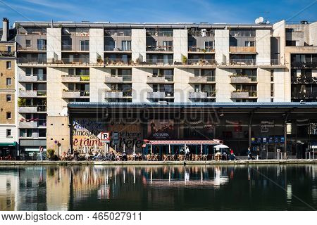 Paris, France, Oct 2022, view of an urban scene by the Bassin de la Villette