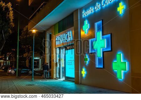 Malaga, Spain - October 23, 2021:night View Of A Drugstore In Teatinos, Malaga