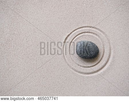 Zen Garden Japanese With White Pebble And Texture Line On Sand Background,top View Rock On Sand Symb