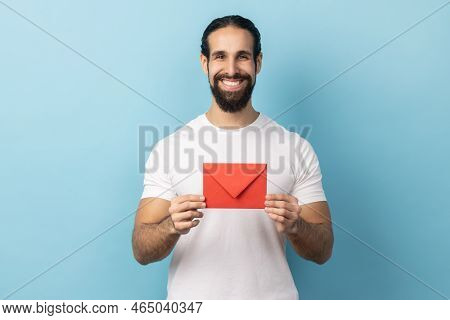 I Got Love Letter On Valentines Day. Portrait Of Man With Beard In White T-shirt Holding Letter In R