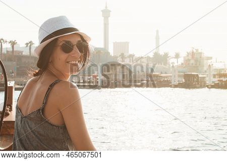 Caucasian Woman Tourist Smile To Camera On Holiday Vacation In Dubai. Tourist On Traditional Abra Bo