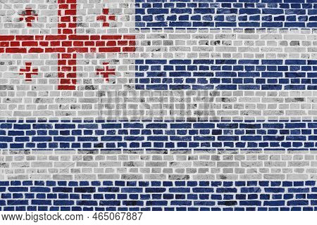Close-up On A Brick Wall With The Flag Of Adjara Painted On It.