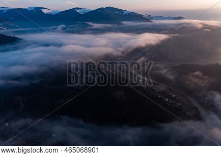 Panorama Of A Ukrainian Mountain Village, A View Of The Village Among The Clouds From Above.