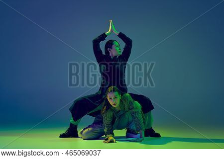 Two Dancers, Stylish Fashionable Dance Couple Dancing Contemporary Dance On Colorful Gradient Blue-g