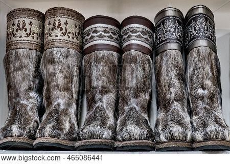 Fur Boots Made Of Natural Deerskin Decorated With Embroidery With Ornament. Three Pairs Of High Fur 