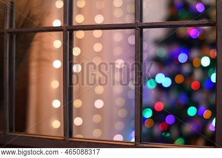Christmas Lights Are Reflected In The Mirror.