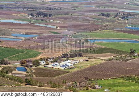 View From The Gydo Pass Near Ceres In The Western Cape Province. Orchards And A Fruit Packing Wareho