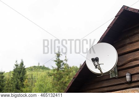 Satelite Is Attached To The Wall Of The House