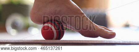 Close-up Of Myofascial Release Of Hyper-movable Muscles Of Foot With Massage Ball. Prevention Of Leg