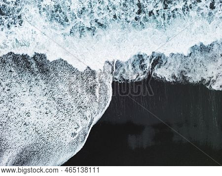 Drone Shot Waves Crashing On The Black Sand Beach