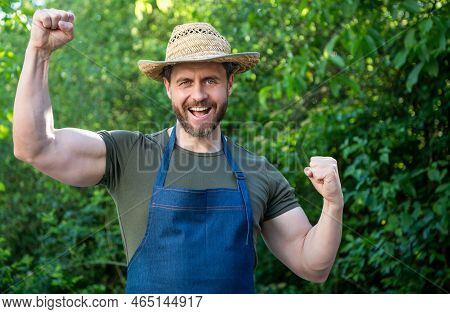 Happy Farmer Man In Farmers Hat And Apron Make Winning Gesture In Garden Aoutdoors