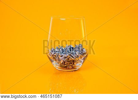 Many Metal Self-tapping Screws Made Of Steel In A Glass, In Bucket Jar. Self-tapping Screw For Metal