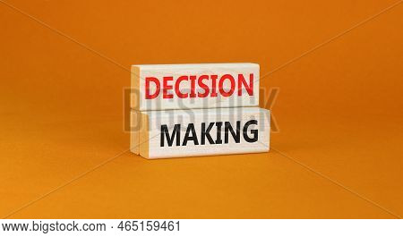 Decision Making Symbol. Concept Words Decision Making On Wooden Blocks. Beautiful Orange Table Orang