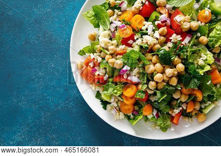 Tabbouleh Salad. Tabouli Salad With Fresh Parsley, Onions, Tomatoes, Bulgur And Chickpea. Healthy Ve