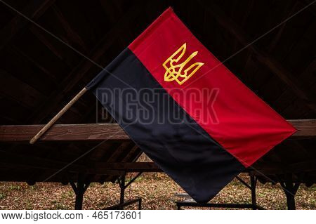 Ukrainian Nationalists Oun Upa Flag. Black And Red Ukraine Flag With Coat Of Arms Trident.