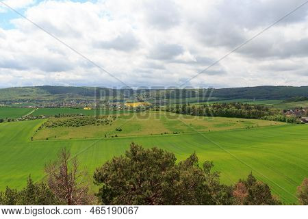 Panorama View Of Harz Mountains With Rapeseed Field Seen From Teufelsmauer, Germany