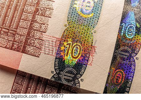 Hologram Tamper-proof Currency Seal Authenticity Watermark Of Ten Euro Banknote Macro.