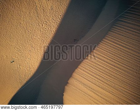 Vertical View Of Desert Dunes - Concept Of Wild Adventure Travel Destination And Beauty Of The Plane