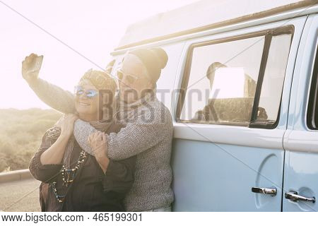 Travel And Alternative People Vacation Concept For Senior Retired Lifestyle Couple Taking Selfie Pic