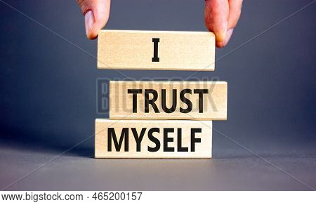 I Trust Myself Symbol. Concept Words I Trust Myself On Wooden Blocks. Businessman Hand. Beautiful Gr