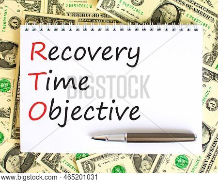 Rto Recovery Time Objective Symbol. Concept Words Rto Recovery Time Objective On White Note On A Bea