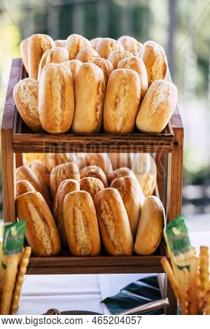 Close Up Of Some Bread On Two Tables Ready To Be Eat For Someone In A Party O Wedding - Unhealthy Wh