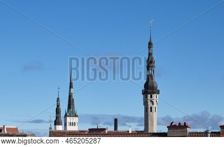 Skyline Of Old Tallinn, Three Towers. Three Steeples Over The Roofs Of The Famous Capital Of Estonia