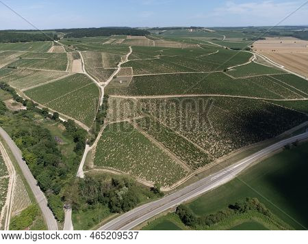 Aerial View On Chablis Grand Cru Appellation Vineyards With Grapes Growing On Limestone And Marl Soi