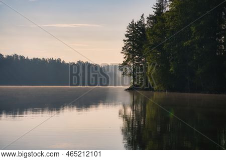 Stone Rocks With Conifers By The Lake In Sweden In Smalland. Wild Nature In Scandinavia. Landscape P